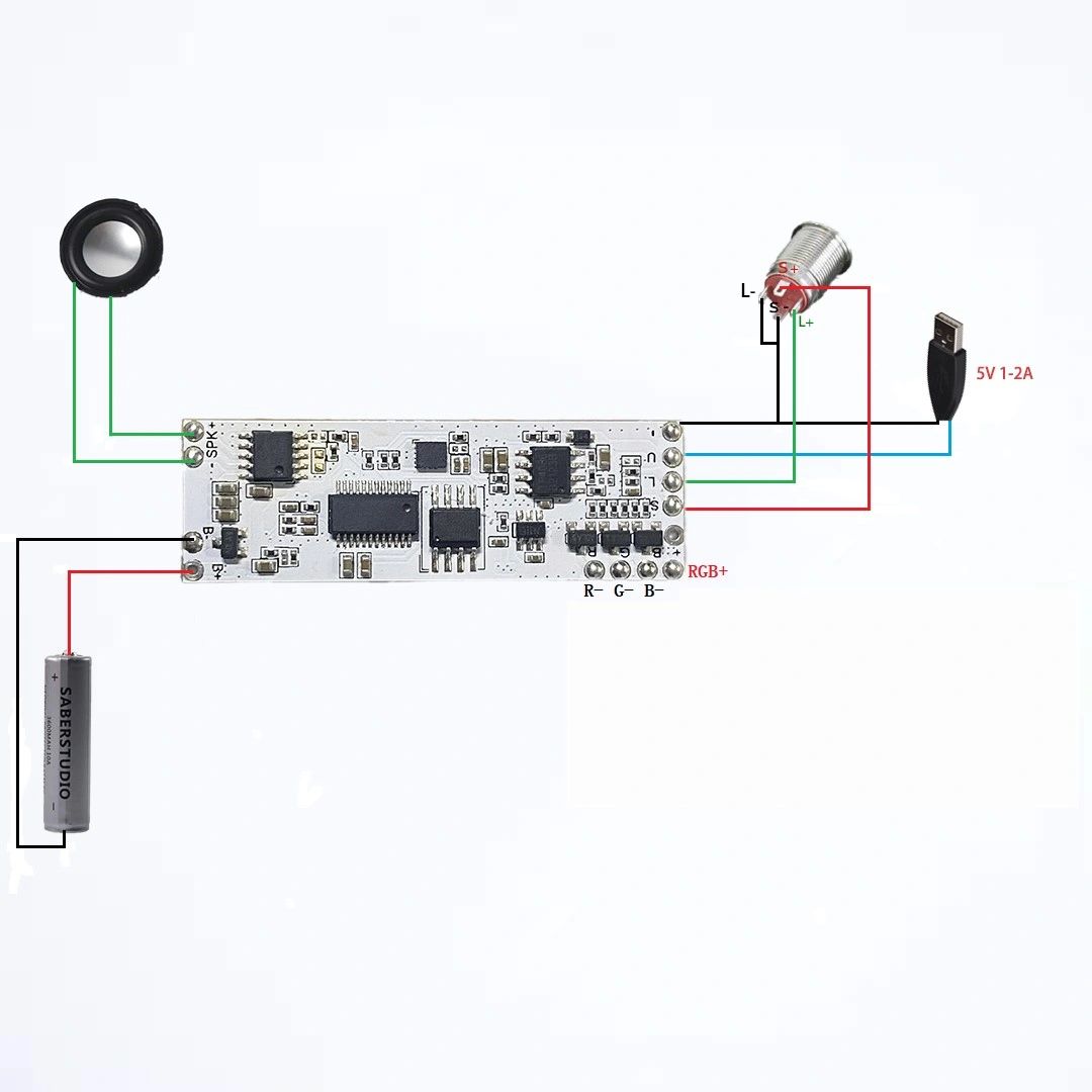 Circuit board powered by battery with speaker, switch, and motor.