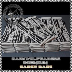 Stack of folded saber bags with a dark background and logo.
