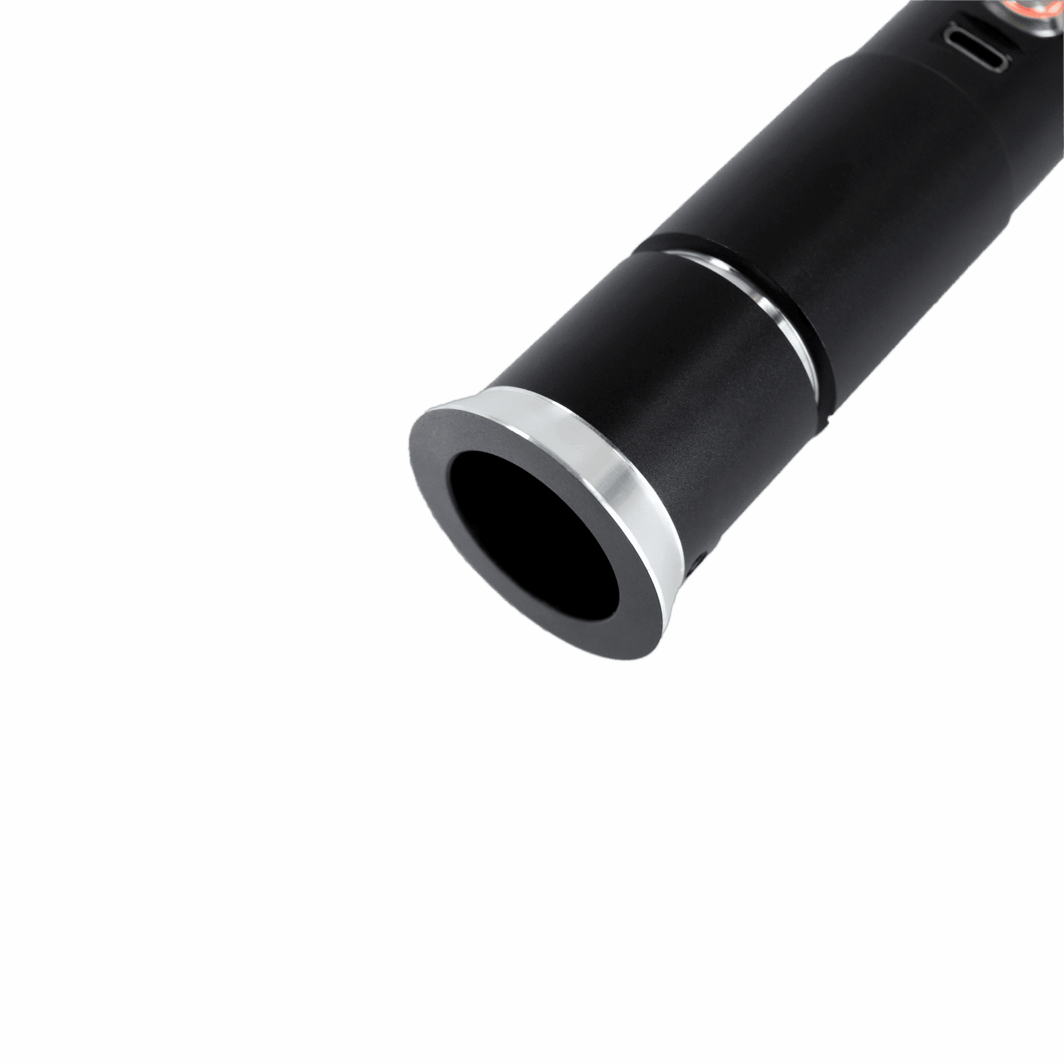 Close-up of a black flashlight against a gray background.