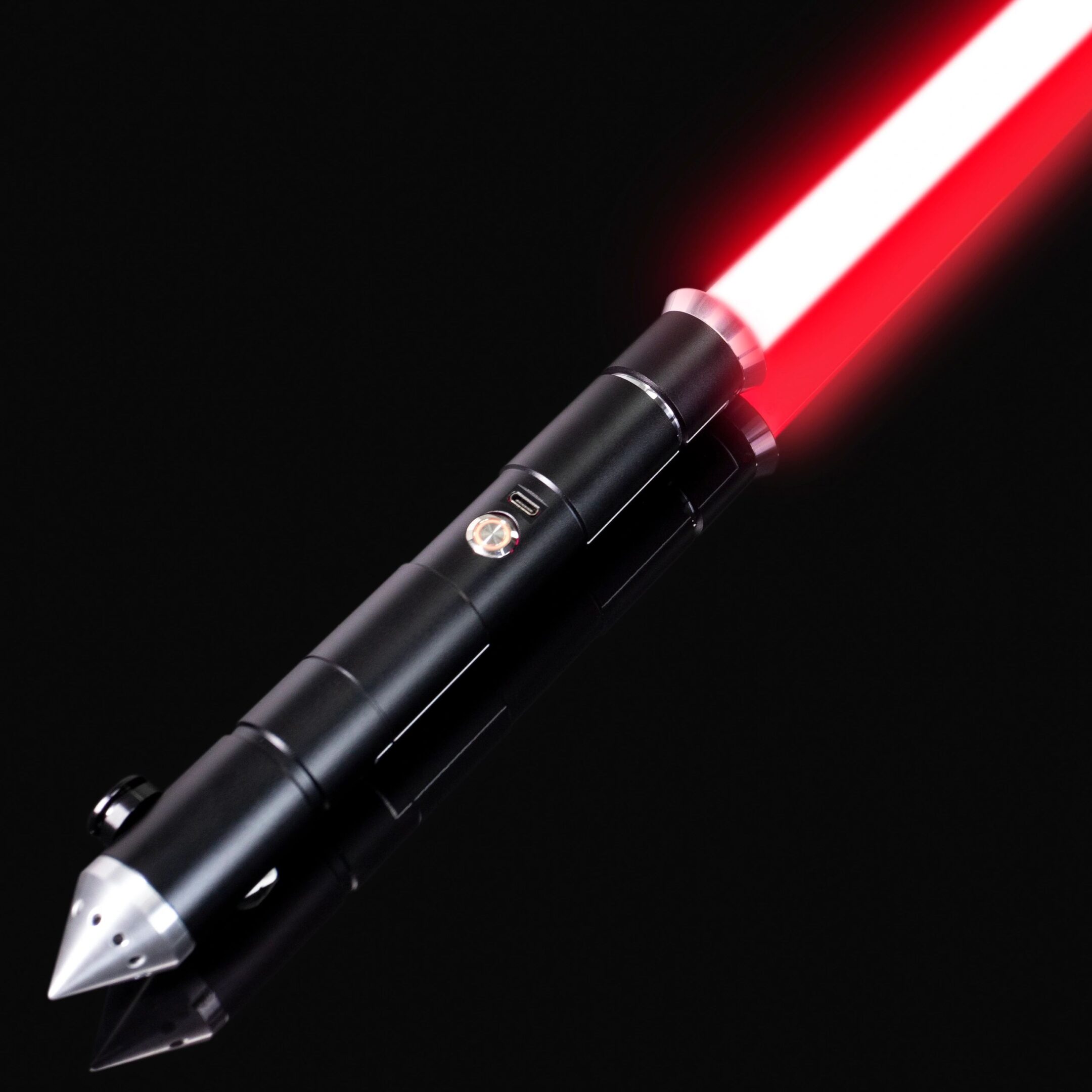 A red lightsaber glowing against a black background.
