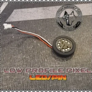 Close-up of a low profile pixel LED component with wiring.