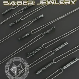 Collection of elegant saber-shaped jewelry pieces on a dark surface.